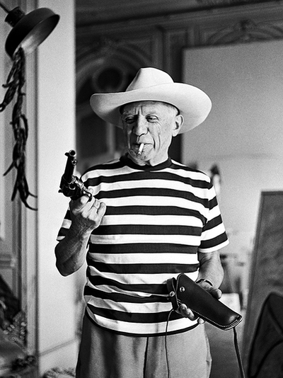 Picasso with revolver and hat of Gary Cooper, 1959, Andre Villers
